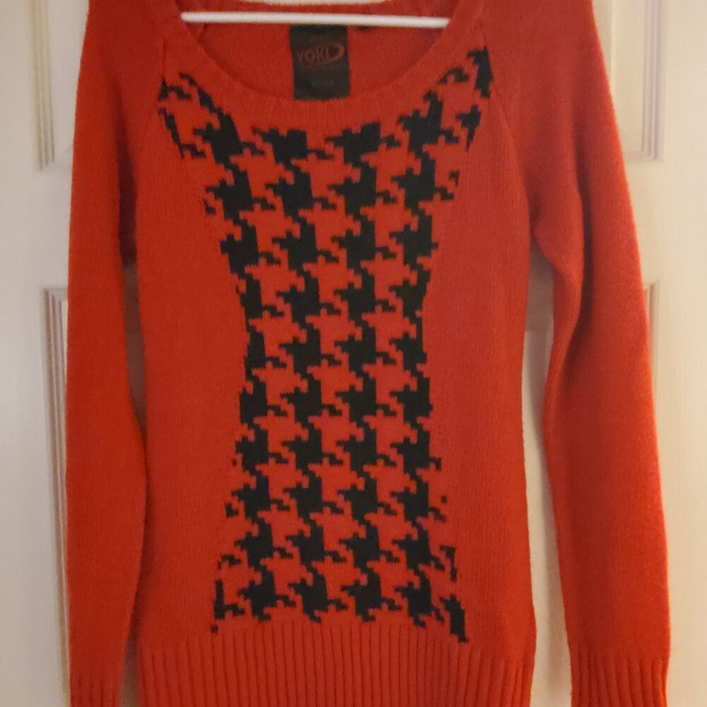 Red and black sweater